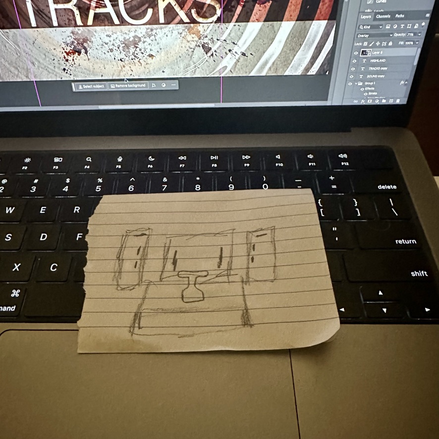 Napkin sketch of the set layout on keyboard, Photoshop layers visible behind