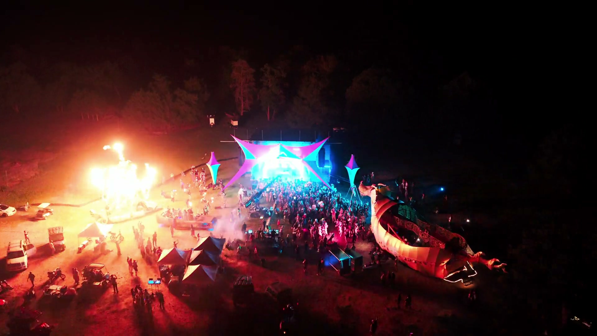 Peak State festival at peak: Lunosol stage rig, fire pillars, El Pulpo Mecanico mechanical octopus, Abraxas dragon art car, full crowd at Valkyrie Ranch